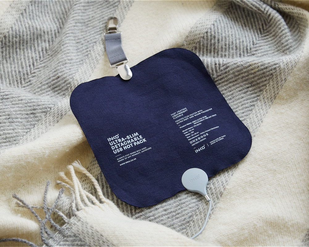 Image: https://1fl0kyr79c.user-space.cdn.idcfcloud.net/photographes/27f50058aa90d0a157e39a7b604eb632.jpg わずか1.5ミリで、じんわり温める|クリップ付きで服に仕込める!銀ナノインクで温める特許技術の「USBウェアラブルヒーター」|INKO(インコ)