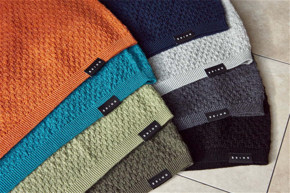 洗濯表示やブランドロゴはプリントされているため、肌に当たって不快になることがありません||《クルーネックニット/男女兼用》自然な調湿・調温・防臭、フリーな履き心地の「WUNDER WEAR CREWNECK」|BRING